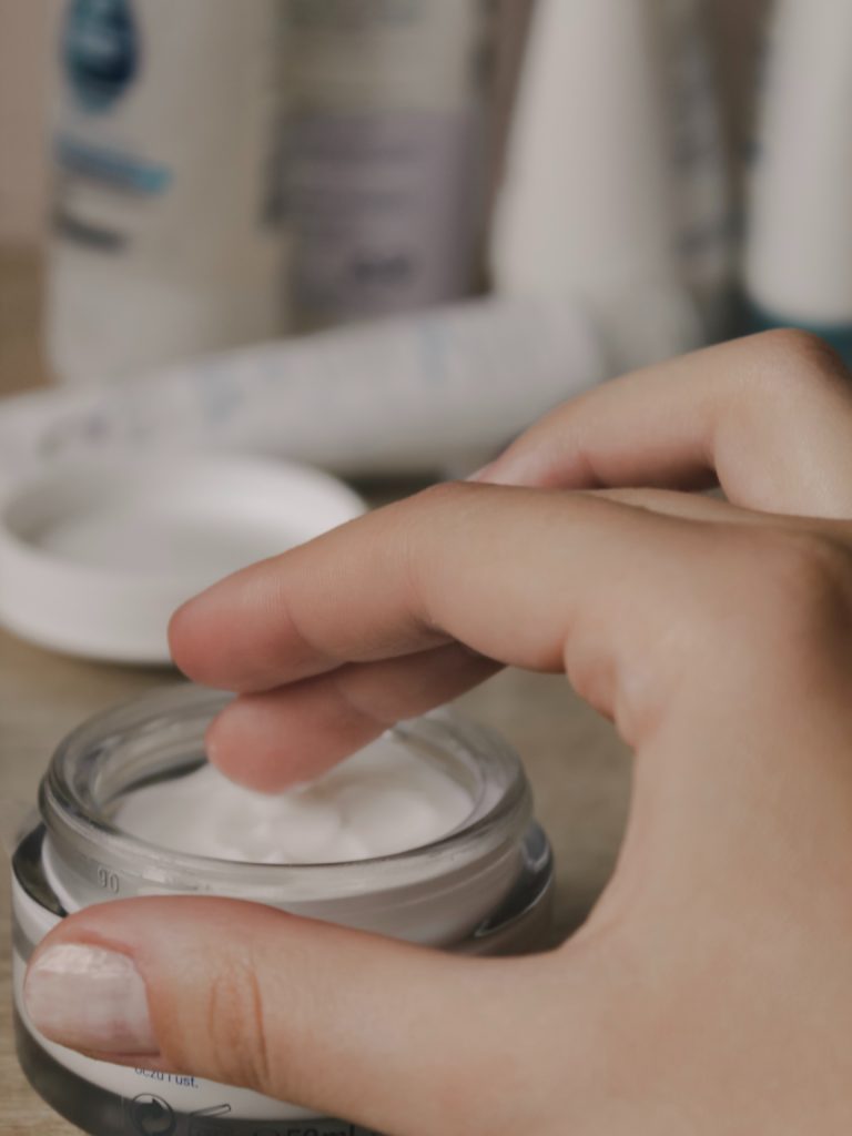 hand in moisturizer